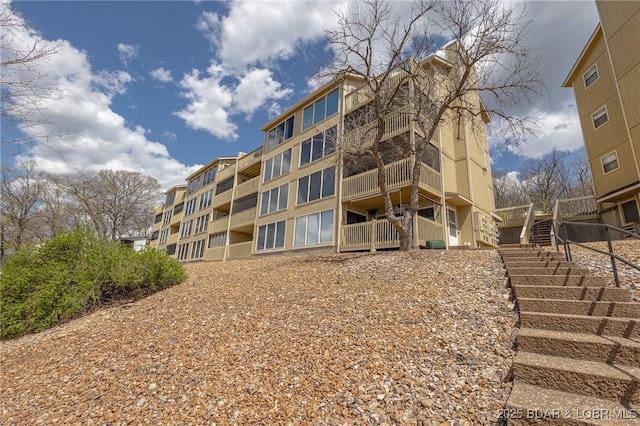 2500 Bay Point Ln Unit 135, Osage Beach, MO 65065 - view of building exterior featuring stairs
