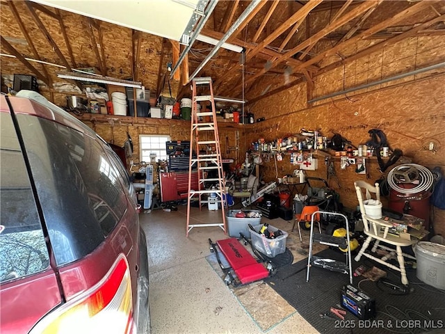 garage featuring a workshop area