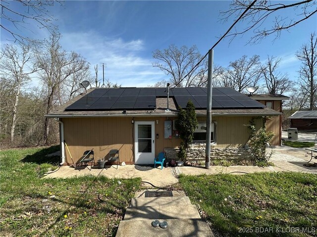 24431 Scenic Ridge Rd, Barnett, MO 65011 - back of property with solar panels