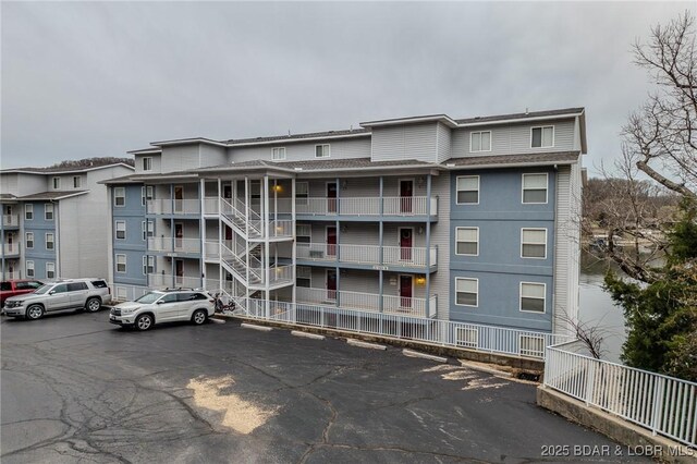 251 Vision Dr Unit 1D, Camdenton, MO 65020 - view of property with uncovered parking