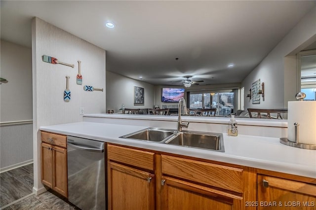 251 Vision Dr Unit 1D, Camdenton, MO 65020 - kitchen with light countertops, stainless steel dishwasher, a sink, and a ceiling fan