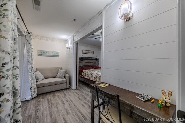 251 Vision Dr Unit 1D, Camdenton, MO 65020 - bedroom featuring visible vents and wood finished floors