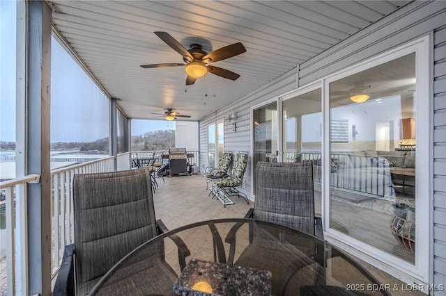 251 Vision Dr Unit 1D, Camdenton, MO 65020 - sunroom / solarium with outdoor dining space and a ceiling fan