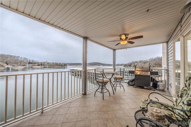 251 Vision Dr Unit 1D, Camdenton, MO 65020 - balcony with grilling area, ceiling fan, and a water view