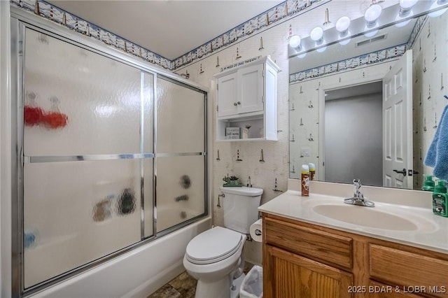 251 Vision Dr Unit 1D, Camdenton, MO 65020 - full bath with vanity, visible vents, toilet, bath / shower combo with glass door, and wallpapered walls