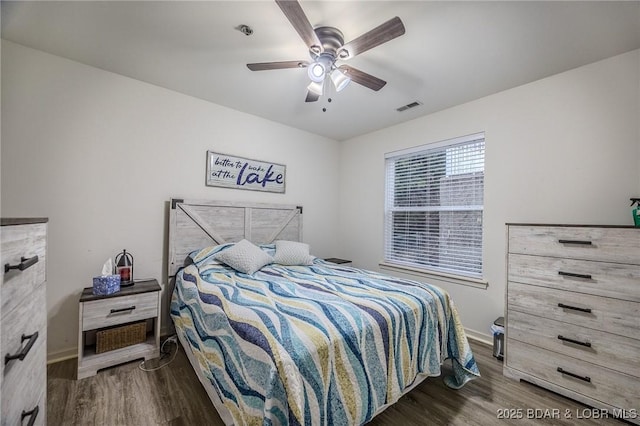 251 Vision Dr Unit 1D, Camdenton, MO 65020 - bedroom with wood finished floors, ceiling fan, baseboards, and visible vents