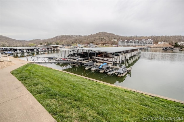 251 Vision Dr Unit 1D, Camdenton, MO 65020 - dock area with a water and mountain view, a lawn, and boat lift