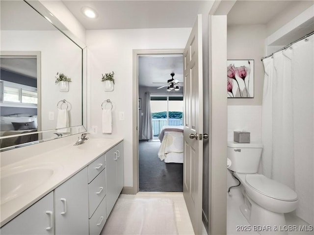 16 Hawk Hill Ct, Lake Ozark, MO 65049 - full bathroom featuring ensuite bathroom, double vanity, ceiling fan, and toilet
