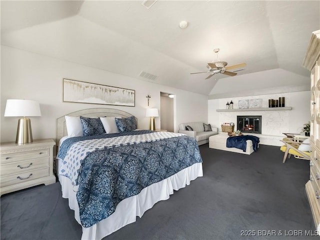 16 Hawk Hill Ct, Lake Ozark, MO 65049 - bedroom featuring dark colored carpet, vaulted ceiling, and ceiling fan