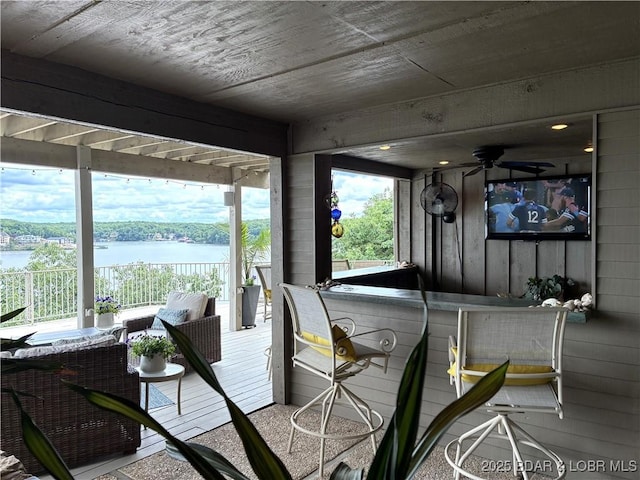 16 Hawk Hill Ct, Lake Ozark, MO 65049 - miscellaneous room featuring ceiling fan, a water view, and wooden walls