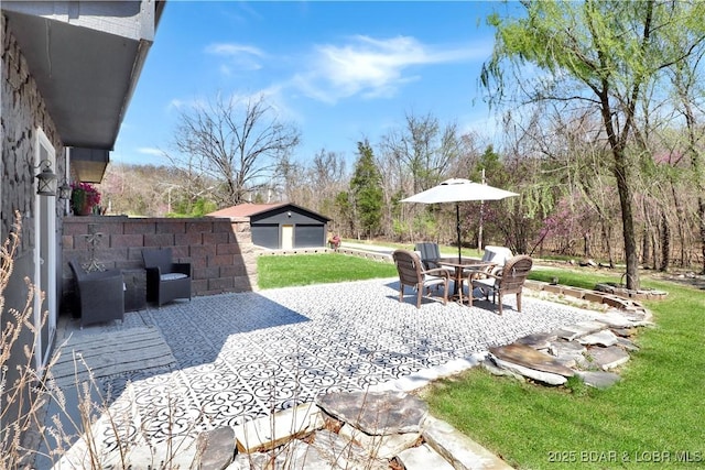 83 Archer Dr, Camdenton, MO 65020 - view of patio / terrace with an outbuilding