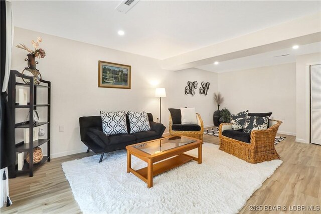83 Archer Dr, Camdenton, MO 65020 - living room featuring recessed lighting, light wood-style floors, baseboards, and visible vents