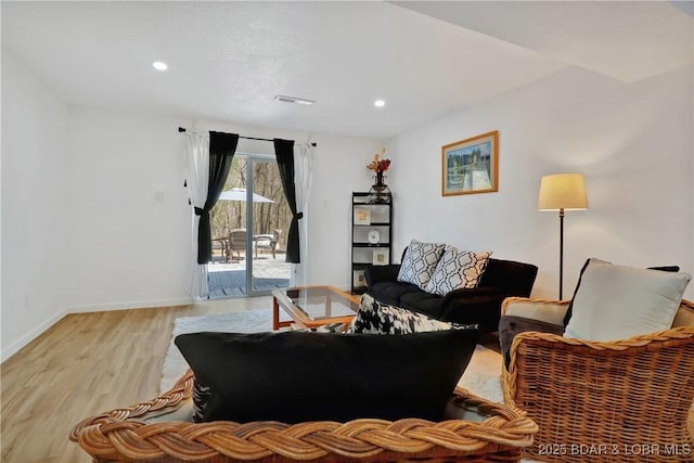 83 Archer Dr, Camdenton, MO 65020 - living room with light wood-style floors, baseboards, visible vents, and recessed lighting