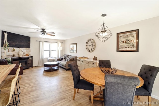 83 Archer Dr, Camdenton, MO 65020 - dining space featuring light wood-style floors and a ceiling fan