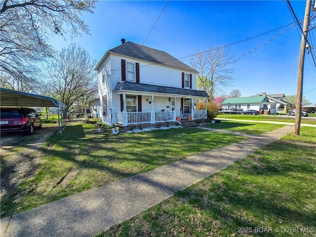 207 S Maple St, Versailles, MO 65084 - view of front of home with a porch, a front yard, and a detached carport