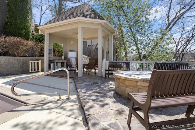 406 N Point Dr, Camdenton, MO 65020 - view of patio featuring a gazebo and outdoor dining space