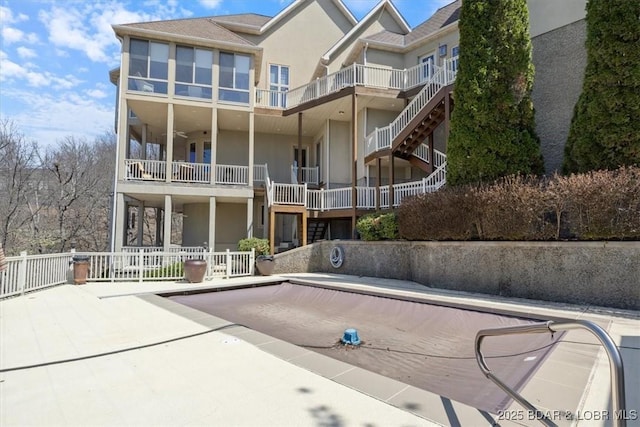406 N Point Dr, Camdenton, MO 65020 - back of property featuring stucco siding and a patio area