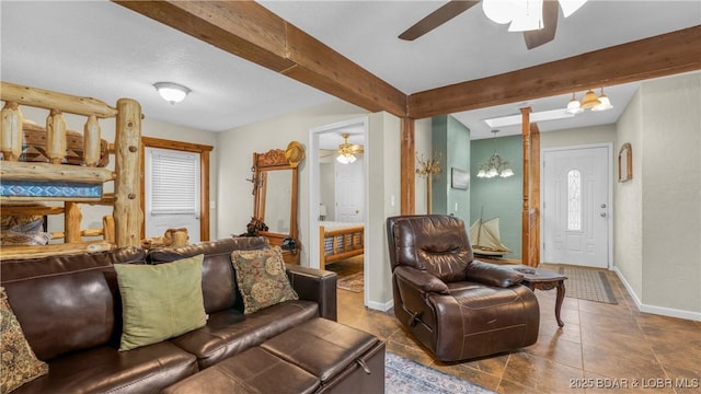 living room featuring beam ceiling, baseboards, a ceiling fan, and tile patterned floors