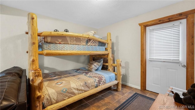 bedroom with baseboards