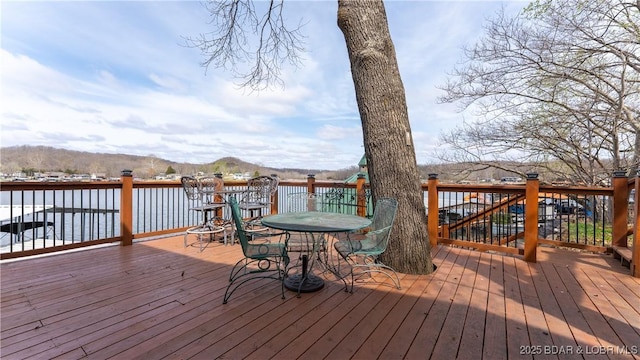 wooden terrace with a mountain view