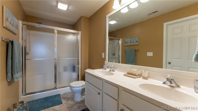 364 Cedar Heights Dr Unit 2B, Camdenton, MO 65020 - bathroom featuring a shower stall, double vanity, and tile patterned flooring