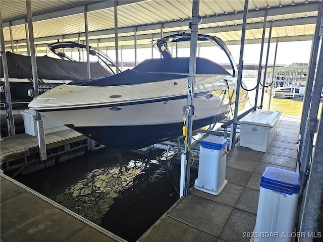 view of dock with boat lift