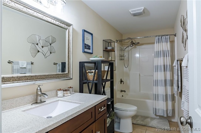 full bath with tile patterned floors, shower / tub combo with curtain, vanity, and toilet