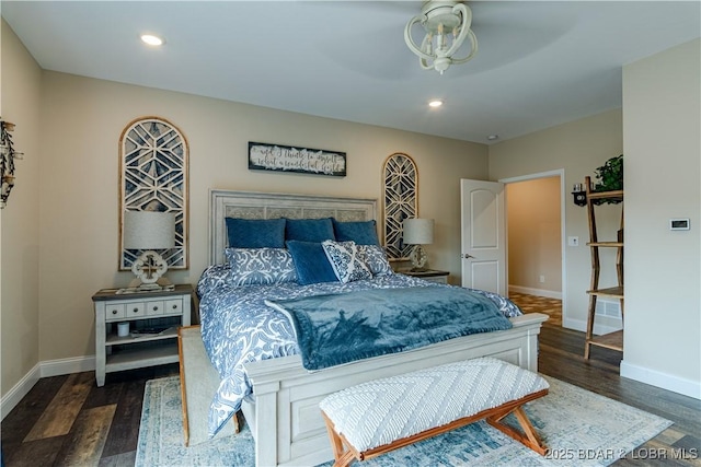 bedroom featuring dark wood-style floors, baseboards, and recessed lighting