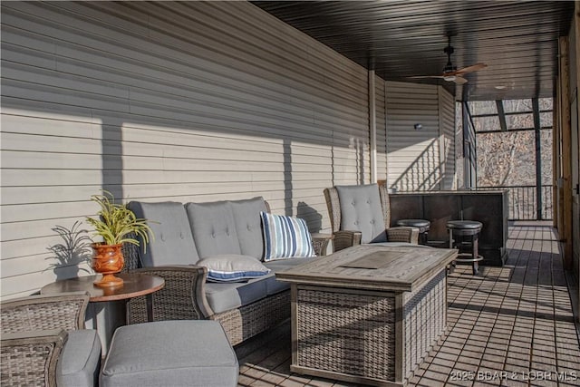 wooden deck with ceiling fan