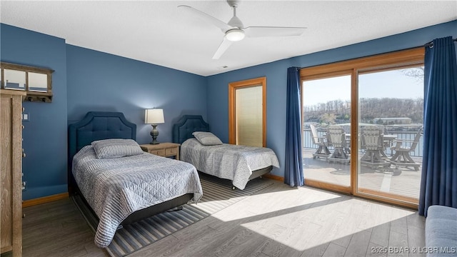 493 Highline Rd, Lake Ozark, MO 65049 - bedroom with access to outside, wood finished floors, baseboards, and a ceiling fan