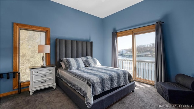 493 Highline Rd, Lake Ozark, MO 65049 - bedroom with dark carpet and access to outside