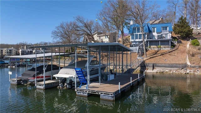 view of dock featuring a water view and boat lift