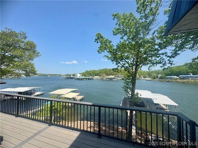 dock area featuring a water view and boat lift