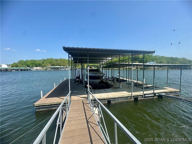 view of dock featuring a water view and boat lift