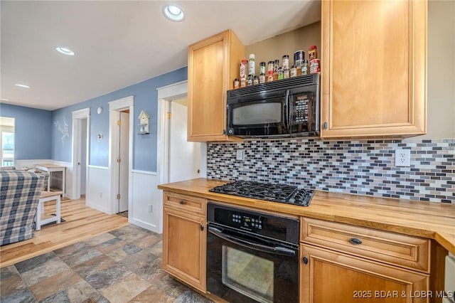 33724 Ivy Bnd, Stover, MO 65078 - kitchen featuring wooden counters, black appliances, recessed lighting, backsplash, and stone finish flooring
