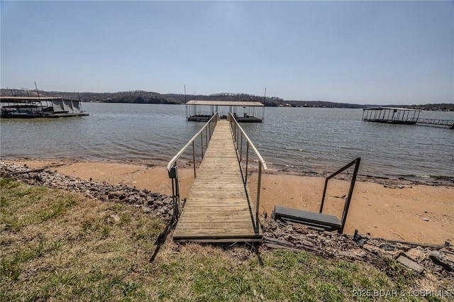 33724 Ivy Bnd, Stover, MO 65078 - dock area featuring a water view