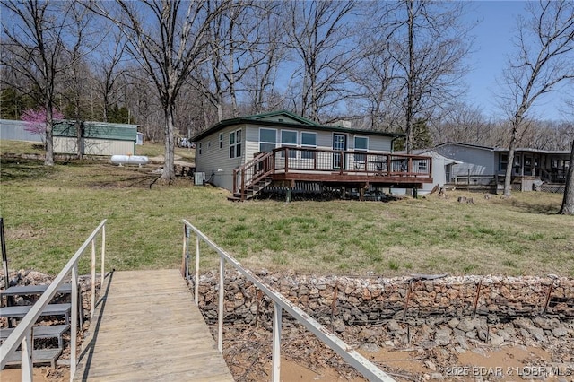 33724 Ivy Bnd, Stover, MO 65078 - rear view of property featuring a deck and a yard