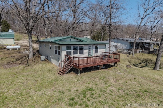 33724 Ivy Bnd, Stover, MO 65078 - back of property featuring a deck, a lawn, and a chimney
