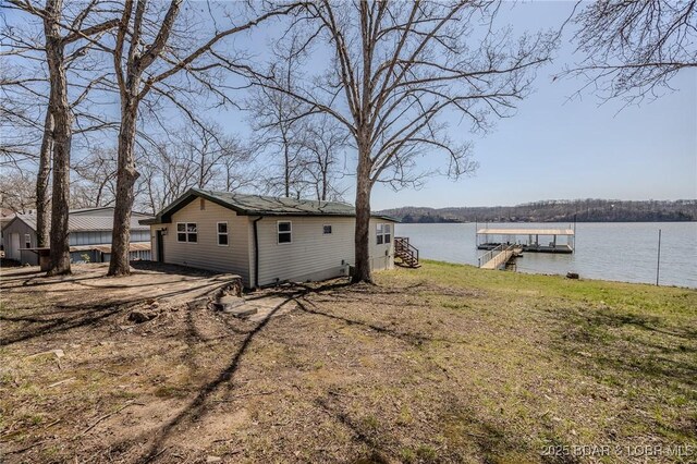33724 Ivy Bnd, Stover, MO 65078 - view of yard featuring a water view and a floating dock