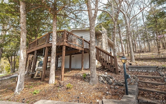 29829 Sheldy Dr, Rocky Mount, MO 65072 - view of side of property with stairway and a deck