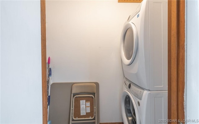 29829 Sheldy Dr, Rocky Mount, MO 65072 - laundry area with stacked washer / drying machine and laundry area