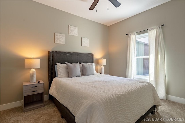 613 Cove Cir, Sunrise Beach, MO 65079 - carpeted bedroom with baseboards and ceiling fan