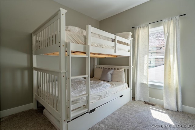 613 Cove Cir, Sunrise Beach, MO 65079 - carpeted bedroom with baseboards