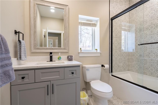 613 Cove Cir, Sunrise Beach, MO 65079 - full bathroom featuring vanity, toilet, and enclosed tub / shower combo
