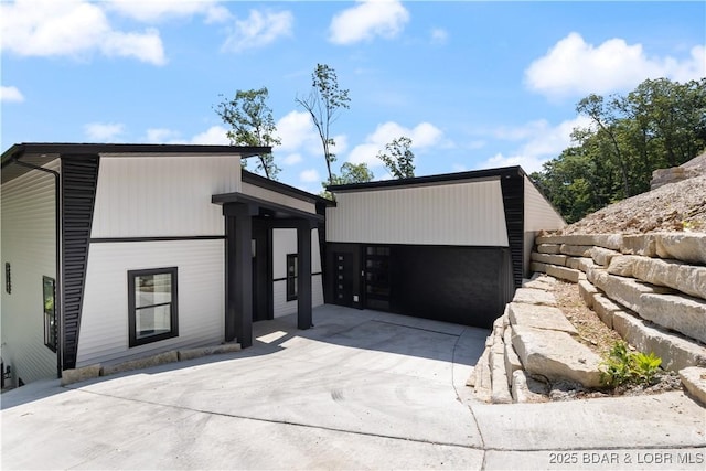 613 Cove Cir, Sunrise Beach, MO 65079 - view of contemporary house
