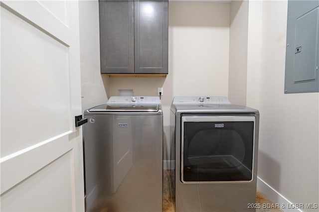 613 Cove Cir, Sunrise Beach, MO 65079 - laundry area featuring electric panel, cabinet space, independent washer and dryer, and baseboards