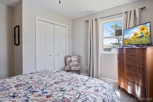 34524 Ivy Bend Rd, Stover, MO 65078 - carpeted bedroom featuring a closet and baseboards