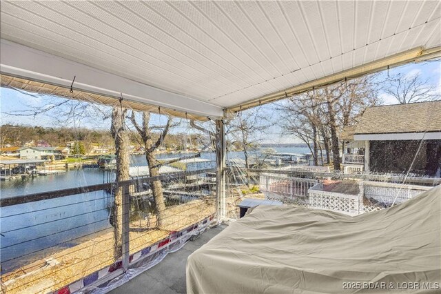 31372 Golden Wood Rd, Gravois Mills, MO 65037 - view of patio / terrace featuring a water view and a balcony