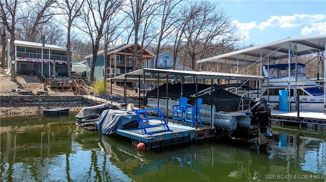 31372 Golden Wood Rd, Gravois Mills, MO 65037 - view of dock featuring boat lift and a water view