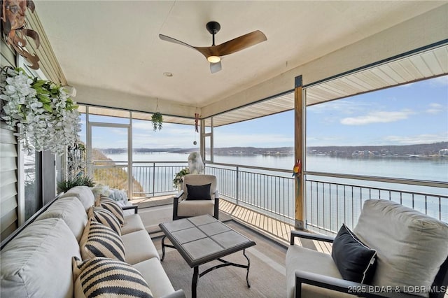 248 Palisades Condo Dr Unit 4A, Lake Ozark, MO 65049 - sunroom with an outdoor hangout area, ceiling fan, a water view, and plenty of natural light